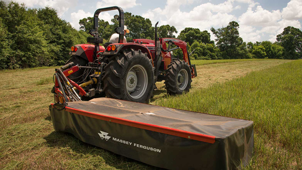 Massey Ferguson farmer series disc mower with tractor in the field