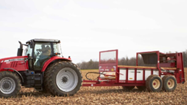 Massey Ferguson 3700 manure spreader in field