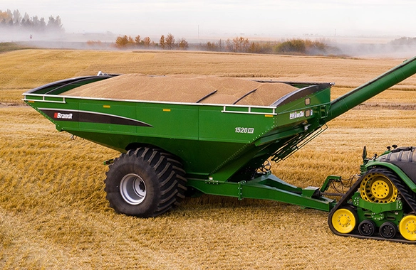 Brandt 1520 XT grain cart with deep, high-capacity design and wide flotation tires, ideal for heavy field loads.